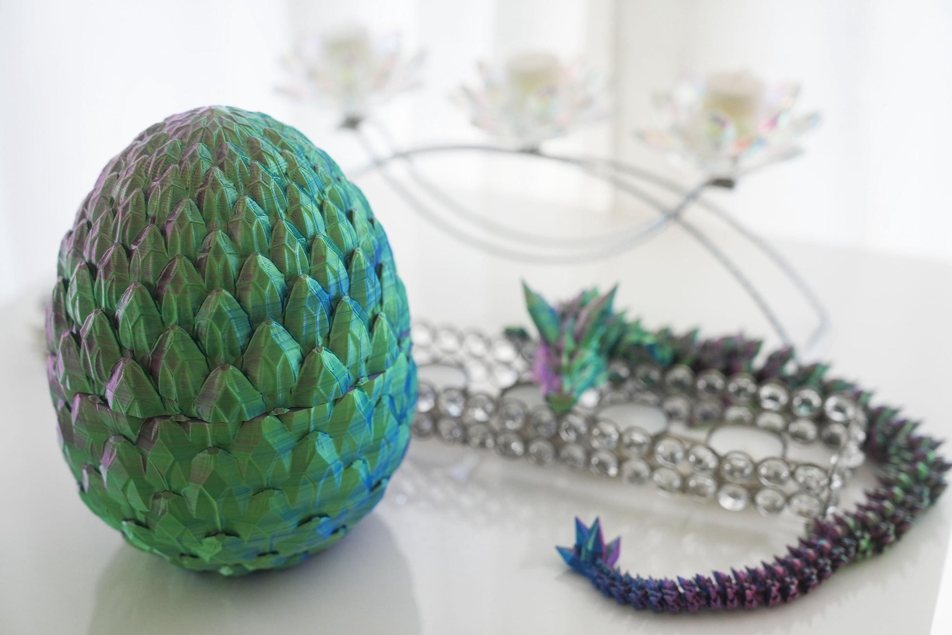 Crystal Dragon posing with Dragon Egg. Focus is on the Dragon Egg.